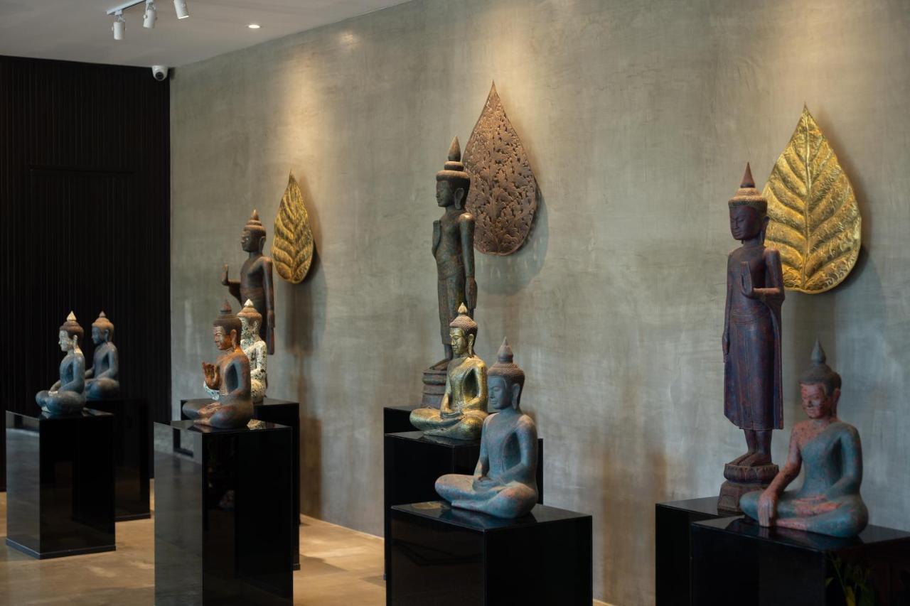 Eightfold Urban Resort Сием Реап Екстериор снимка A collection of Thai and Laotian art