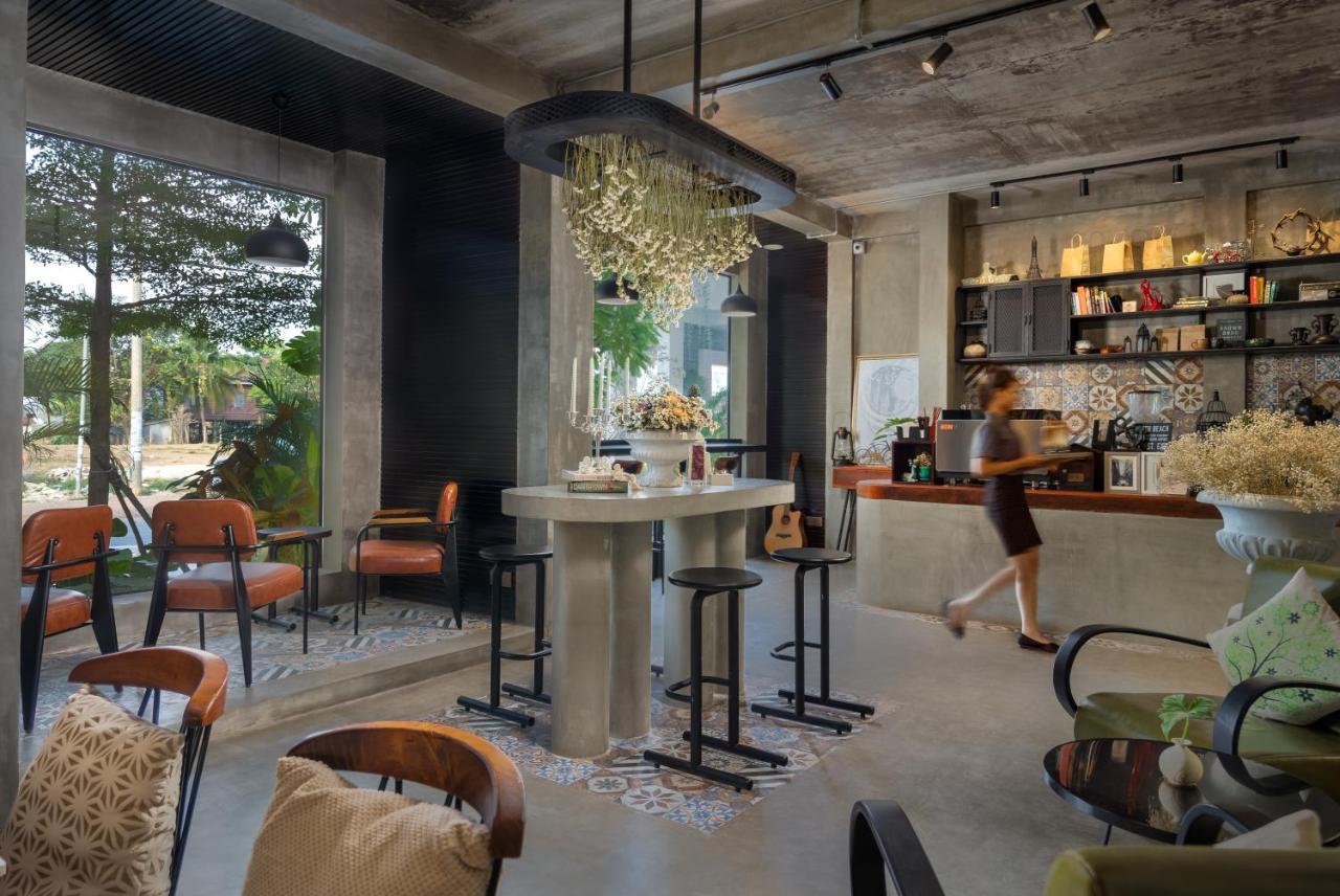 Eightfold Urban Resort Сием Реап Екстериор снимка Interior of a coffee shop in Bangkok, Thailand